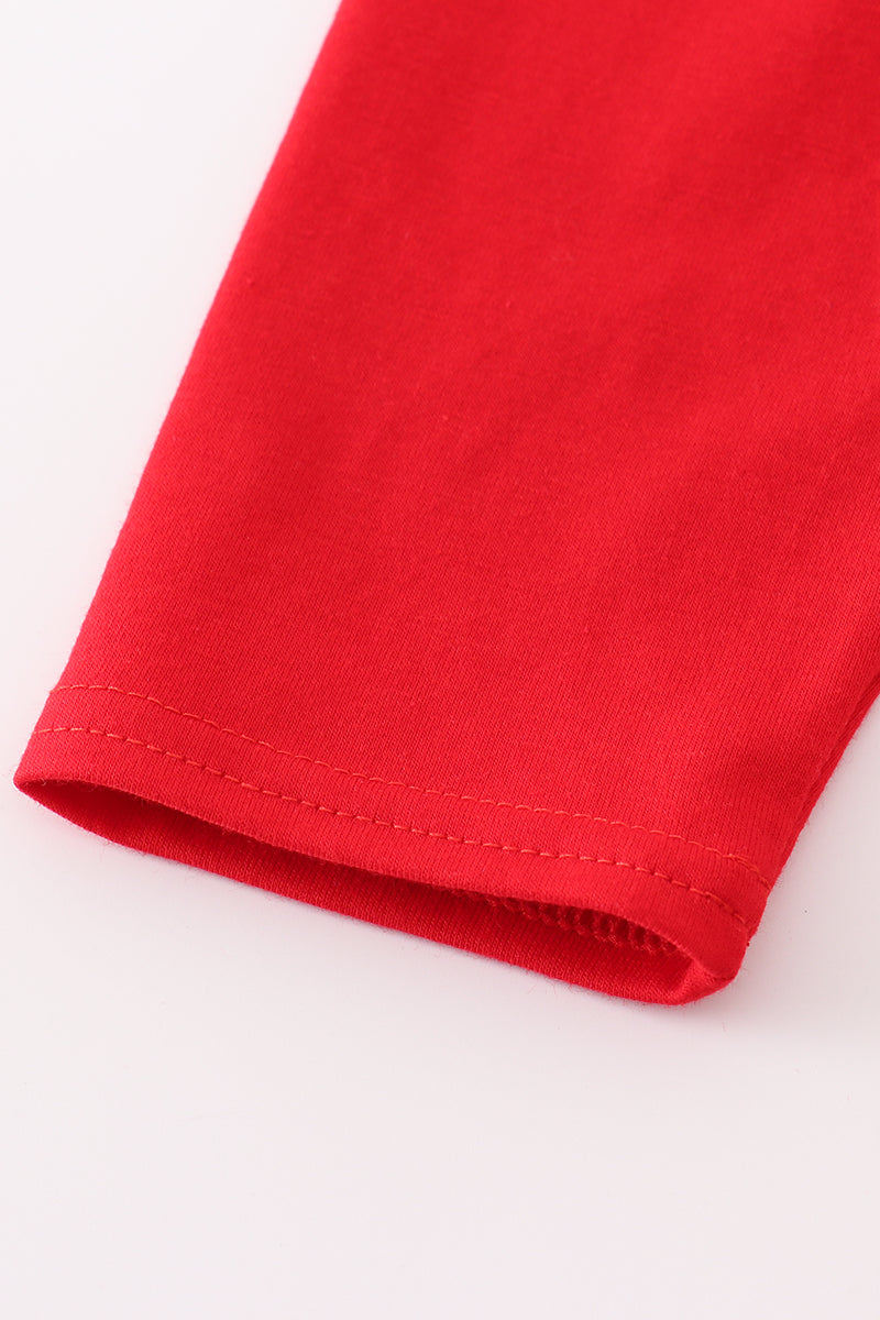 Close-up of a red fabric edge on a white background