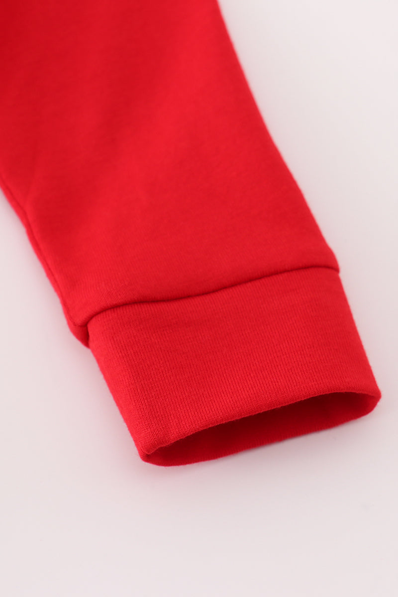 Close-up of a red sleeve on a white background