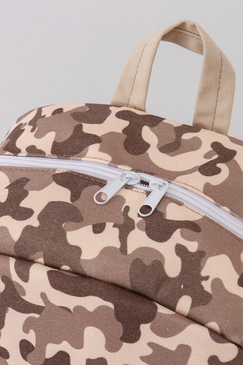 Camouflage-patterned bag with a white zipper on a light gray background