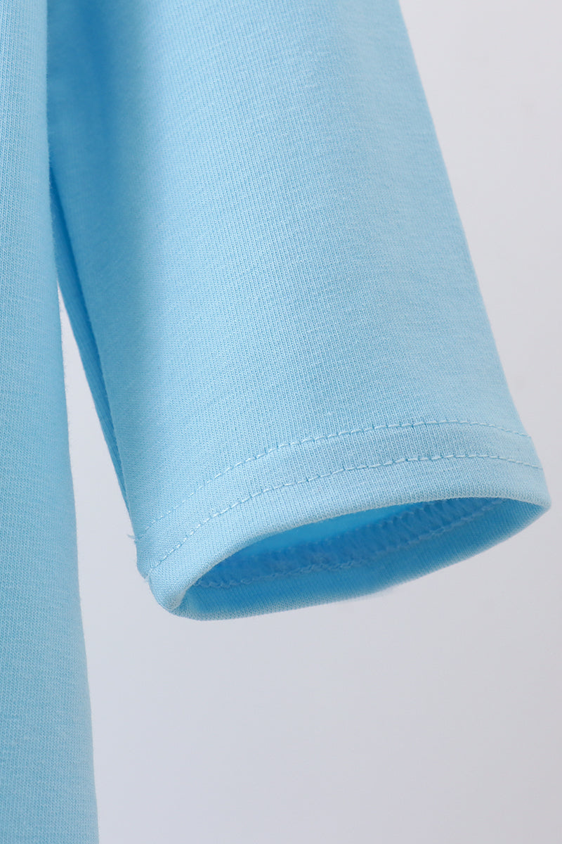 Close-up of light blue fabric on a white background