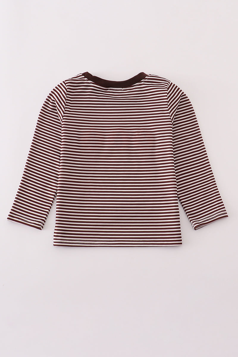 Striped long-sleeve shirt on a light gray background