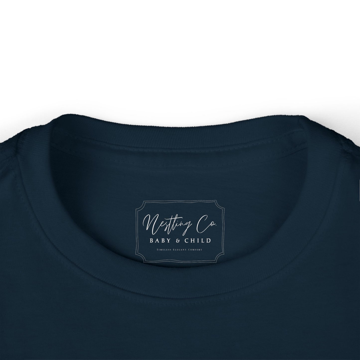 Navy blue shirt with a label on the collar