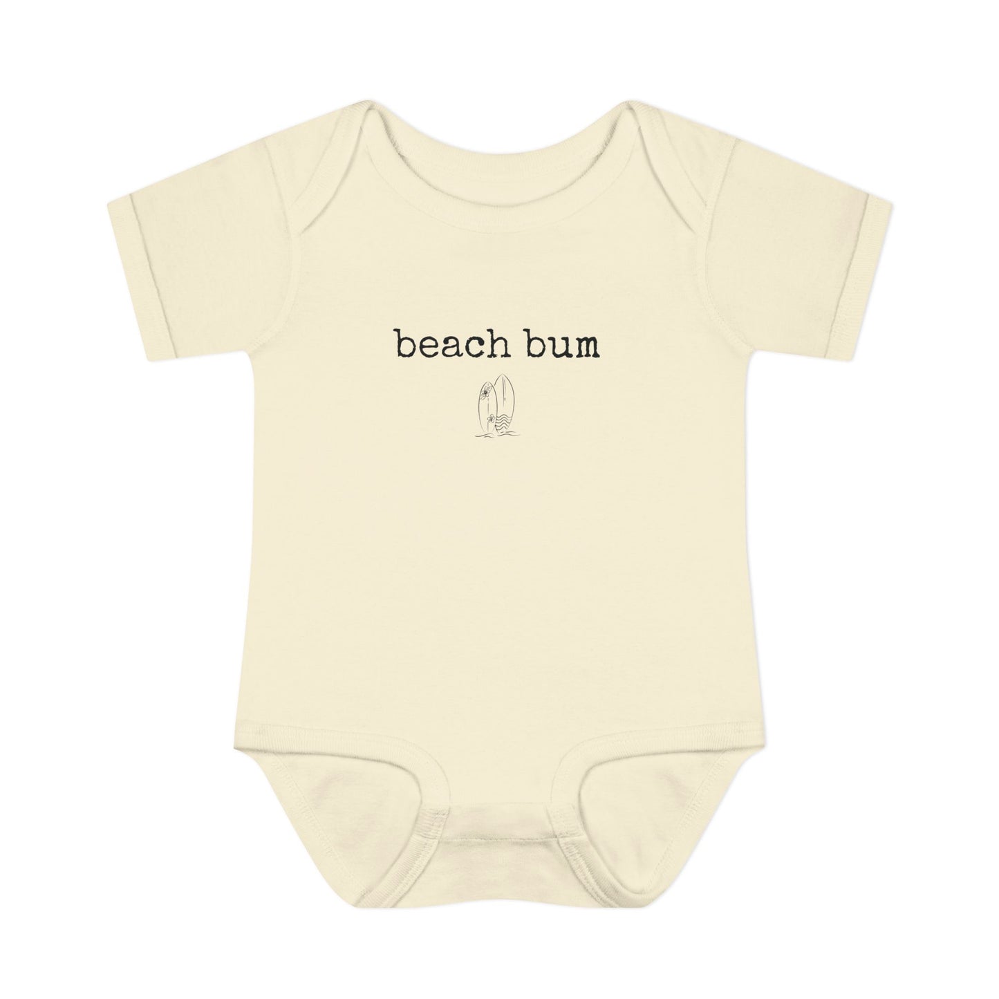 Beige baby onesie with 'beach bum' text on a white background