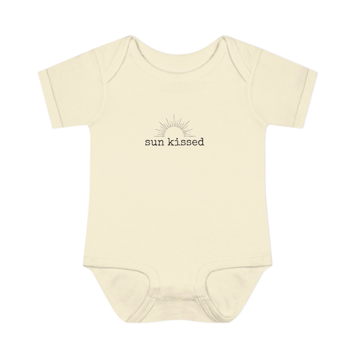 Beige baby onesie with 'sun kissed' text on a white background