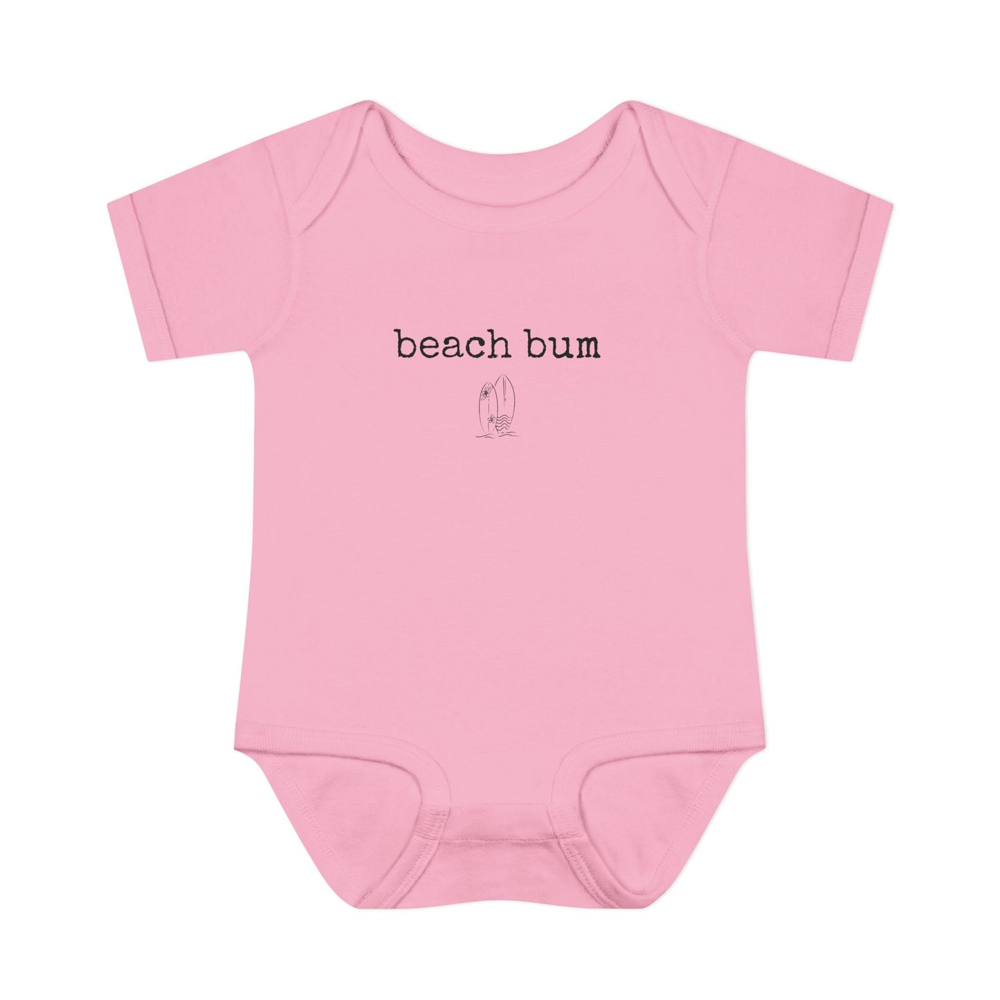Pink baby onesie with 'beach bum' text on a white background