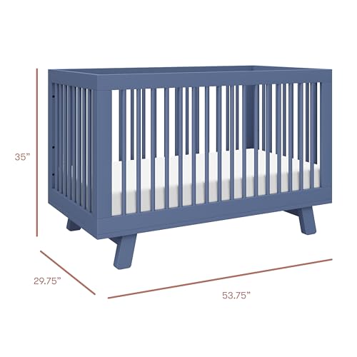Blue crib with dimensions indicated on a white background