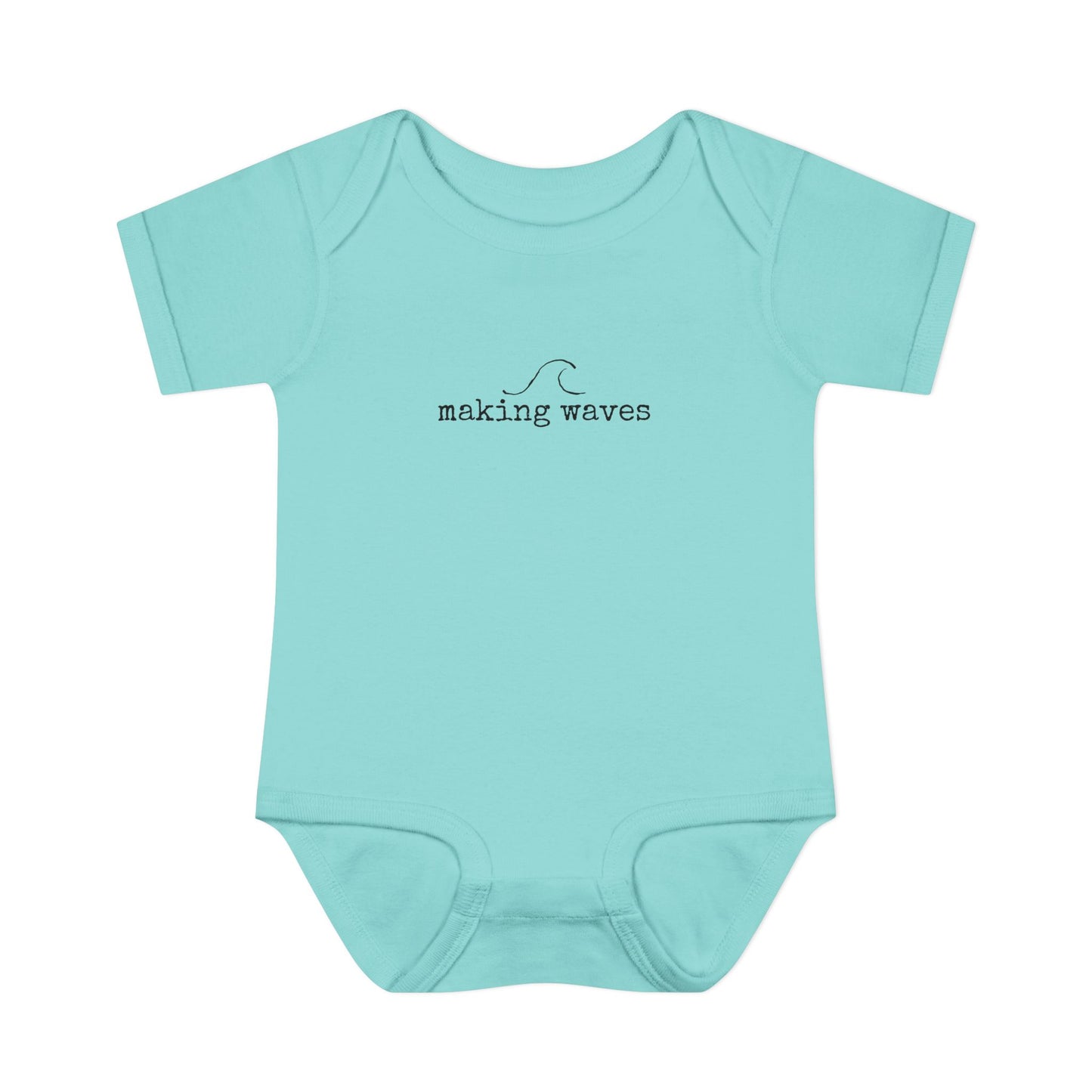 Light blue baby onesie with 'making waves' text on a white background