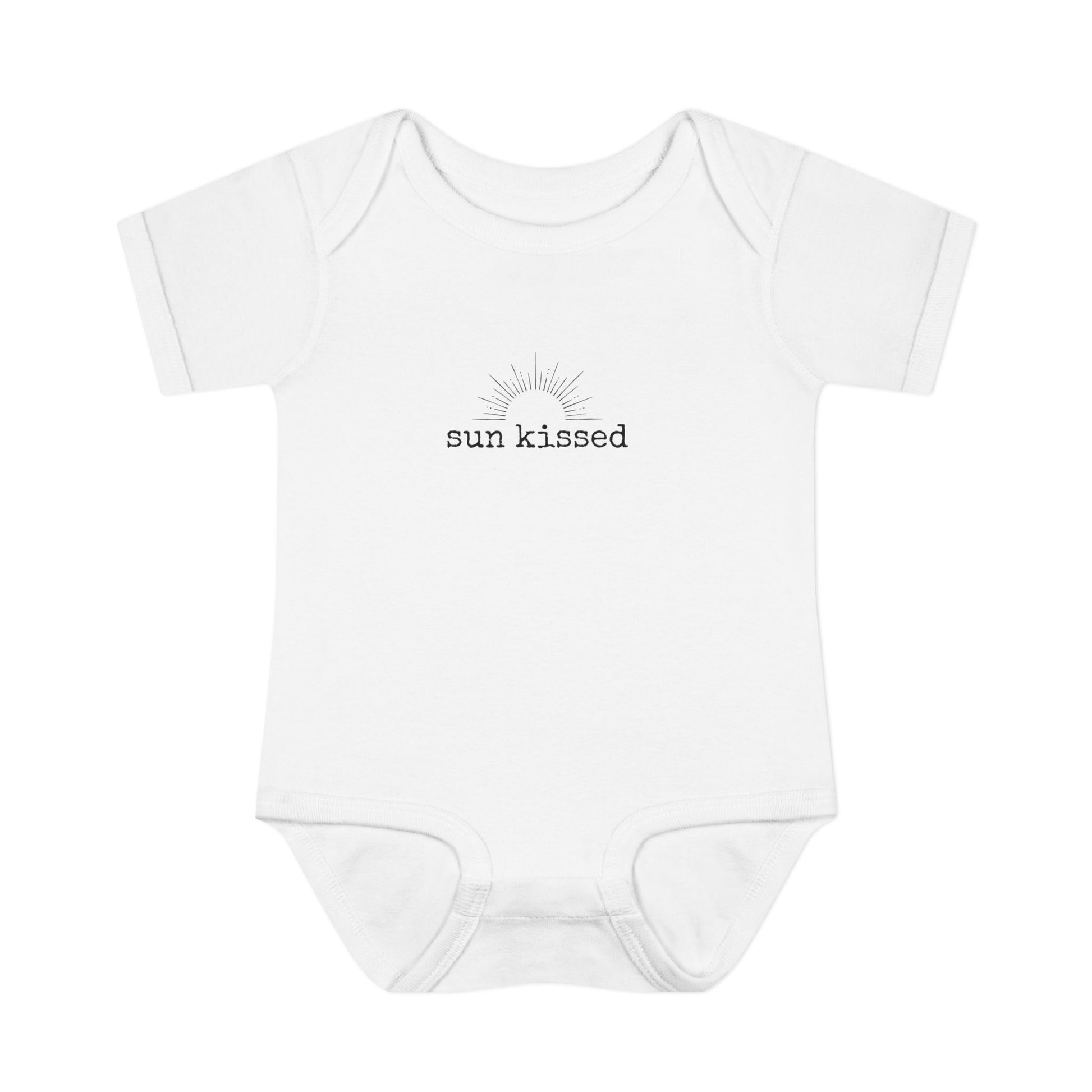 White baby onesie with 'sun kissed' text on a white background