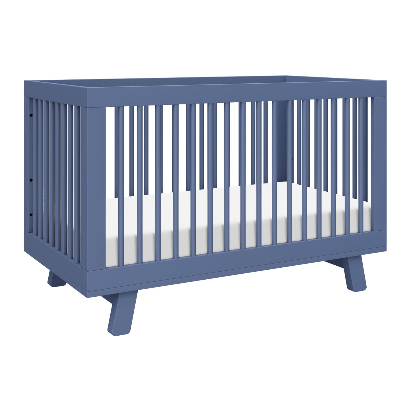 Blue crib with white mattress on a white background