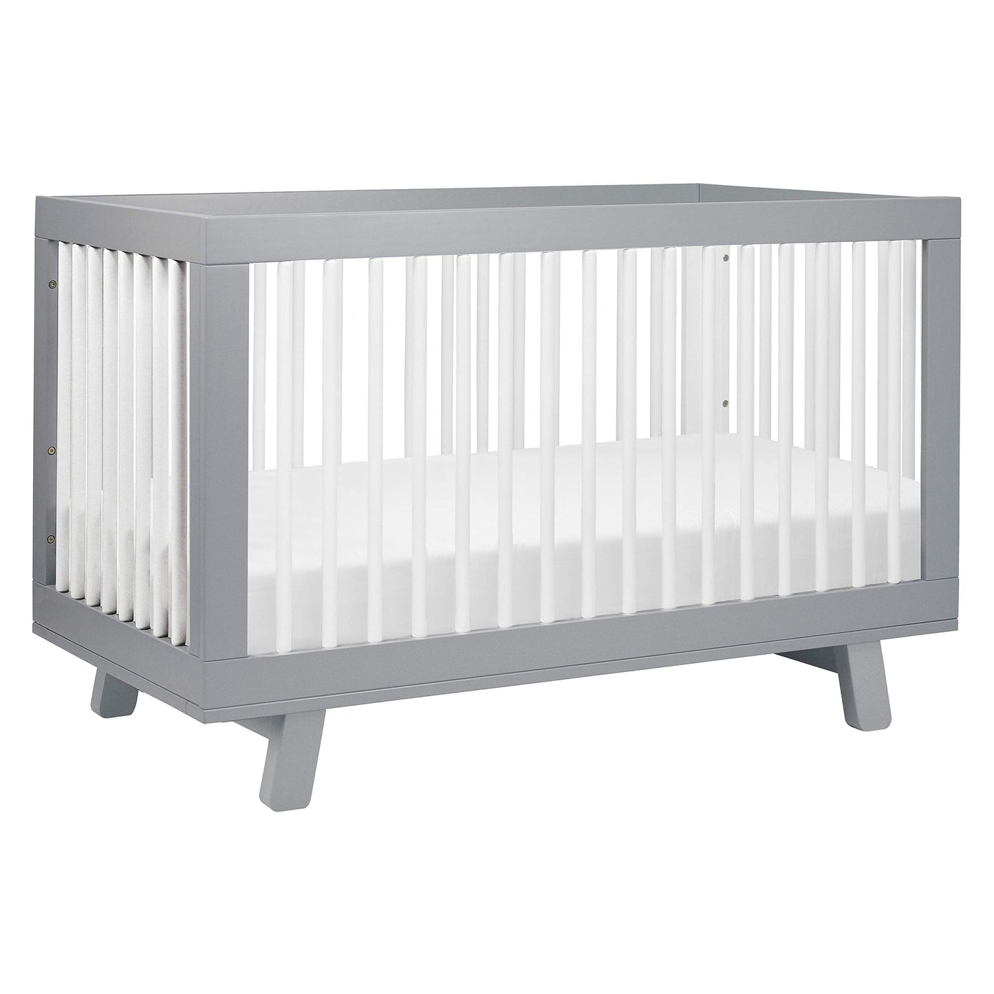 Gray crib with white mattress on a white background