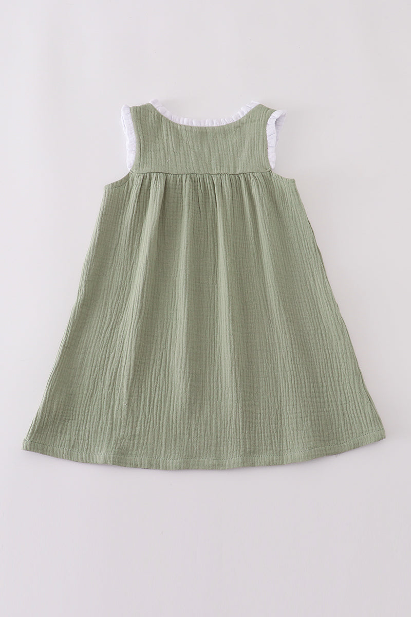 Green dress on a white background