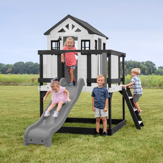 Sweetwater Heights White Cedar Wooden Elevated Kids Playhouse with Wave Slide, Play Kitchen, and Deck