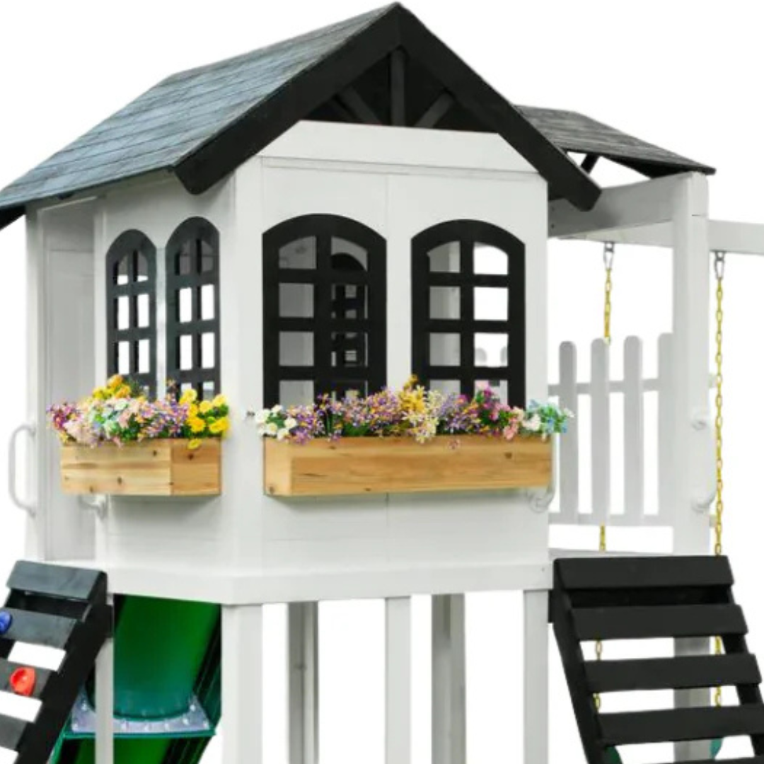 Children's playhouse with flower boxes and a swing set on a white background