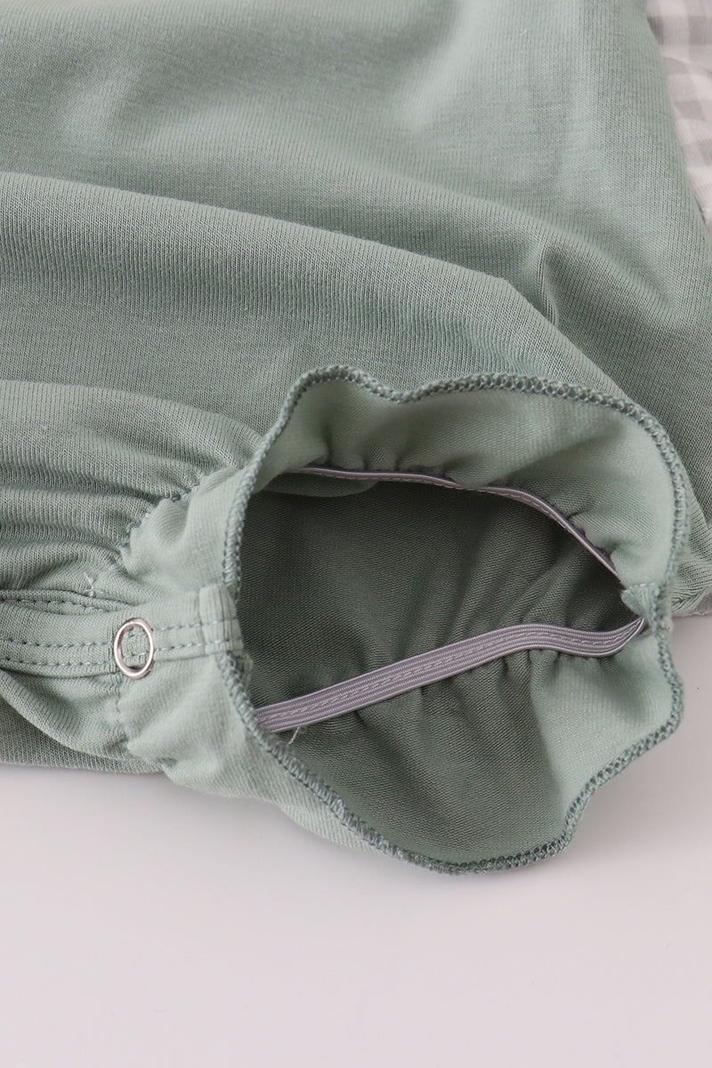 Close-up of a green fabric product with a white background