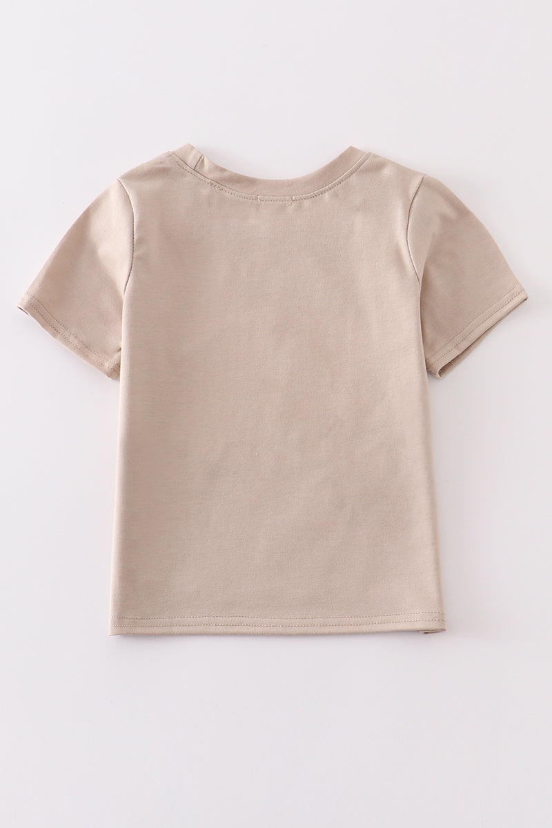 Beige t-shirt on a white background