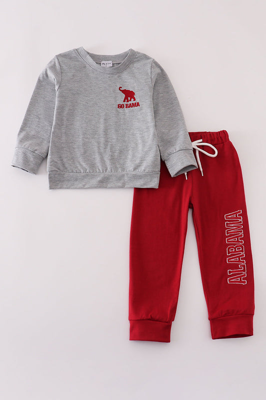Gray sweatshirt with red logo and red pants with 'Alabama' text on a light gray background