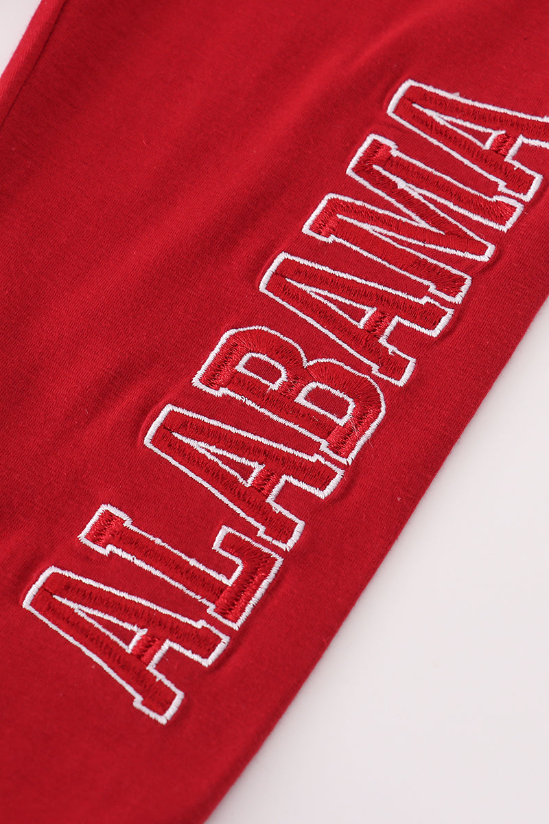 Red sweatshirt with 'Alabama' embroidered on a white background