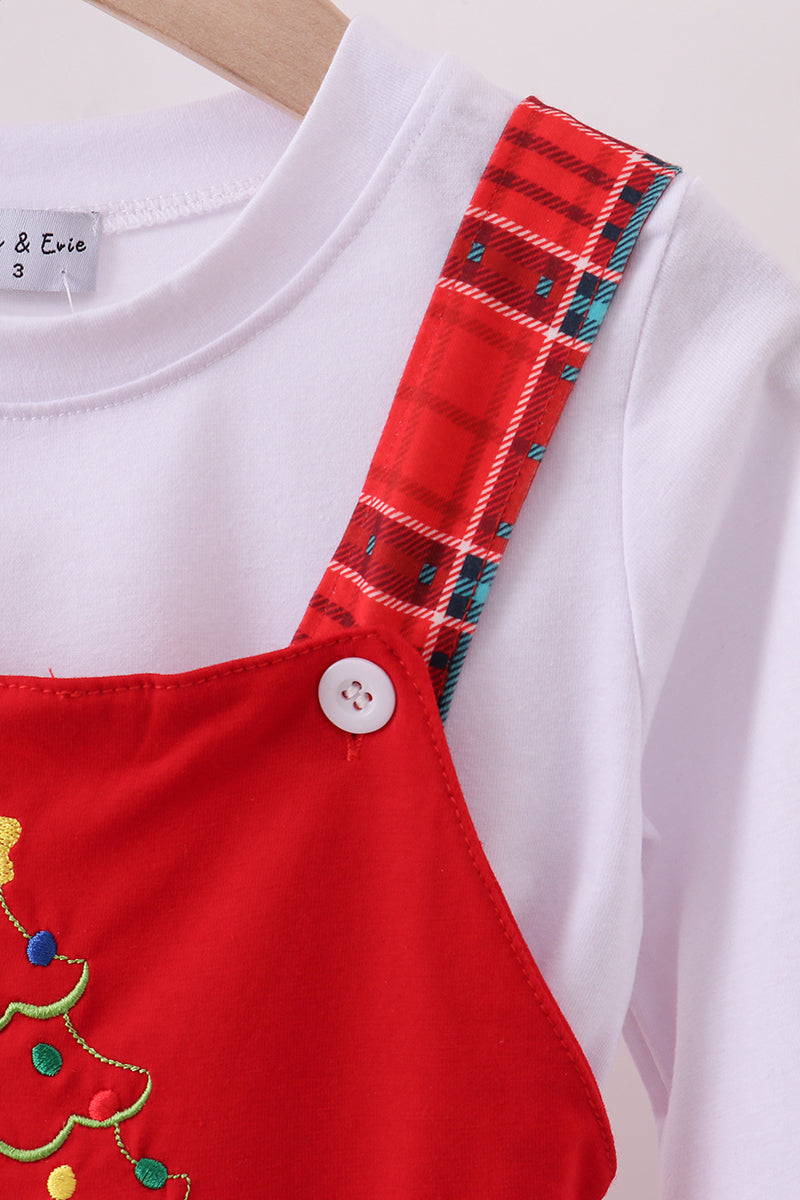 White shirt with red plaid strap and embroidered Christmas tree design on a white background