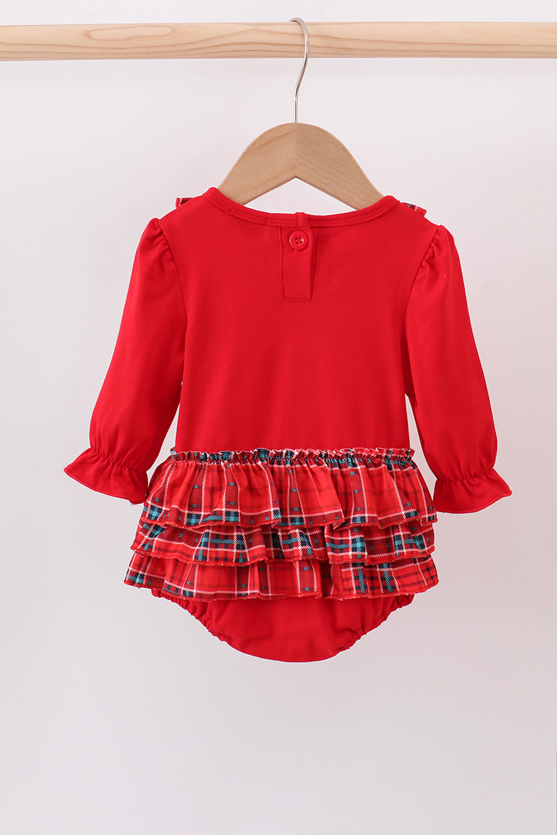 Red baby outfit with plaid ruffle on a white background