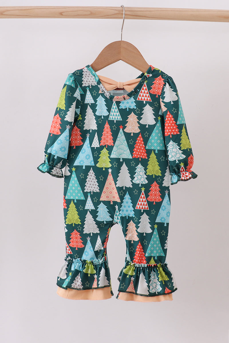 Children's outfit with tree-patterned design on a hanger against a white background