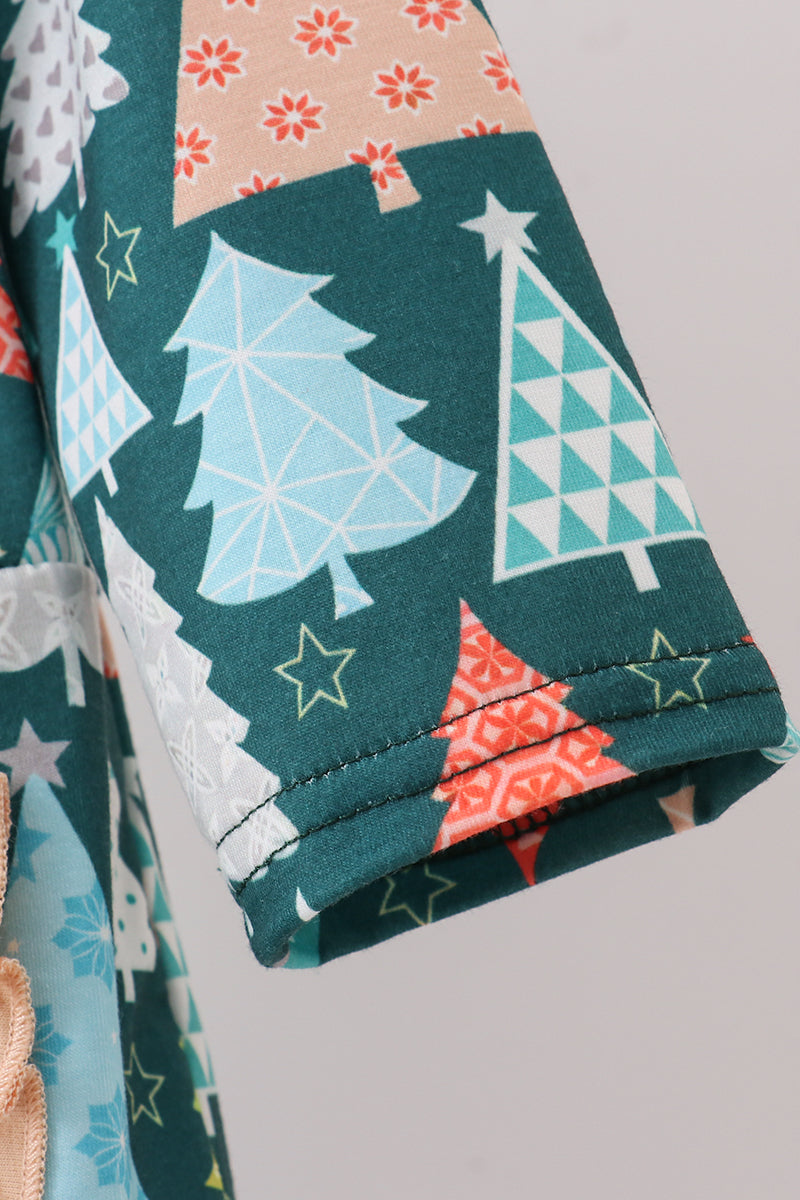 Folded fabric with Christmas tree pattern on a gray background