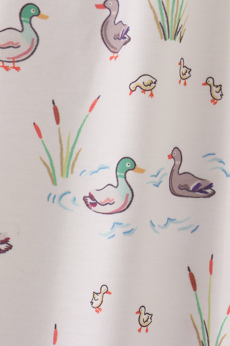 Curtain with colorful duck pattern on a white background