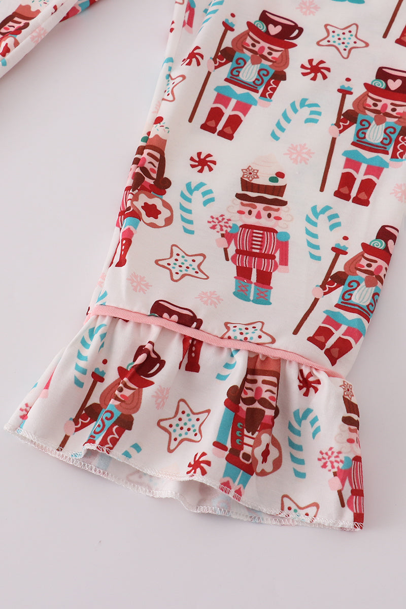 Fabric with Nutcracker pattern on a white background