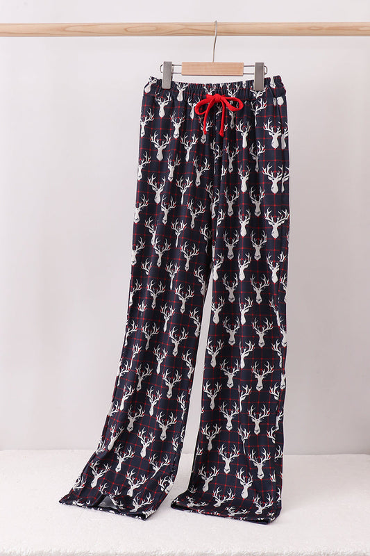 Flannel pajama pants with deer pattern on a white background