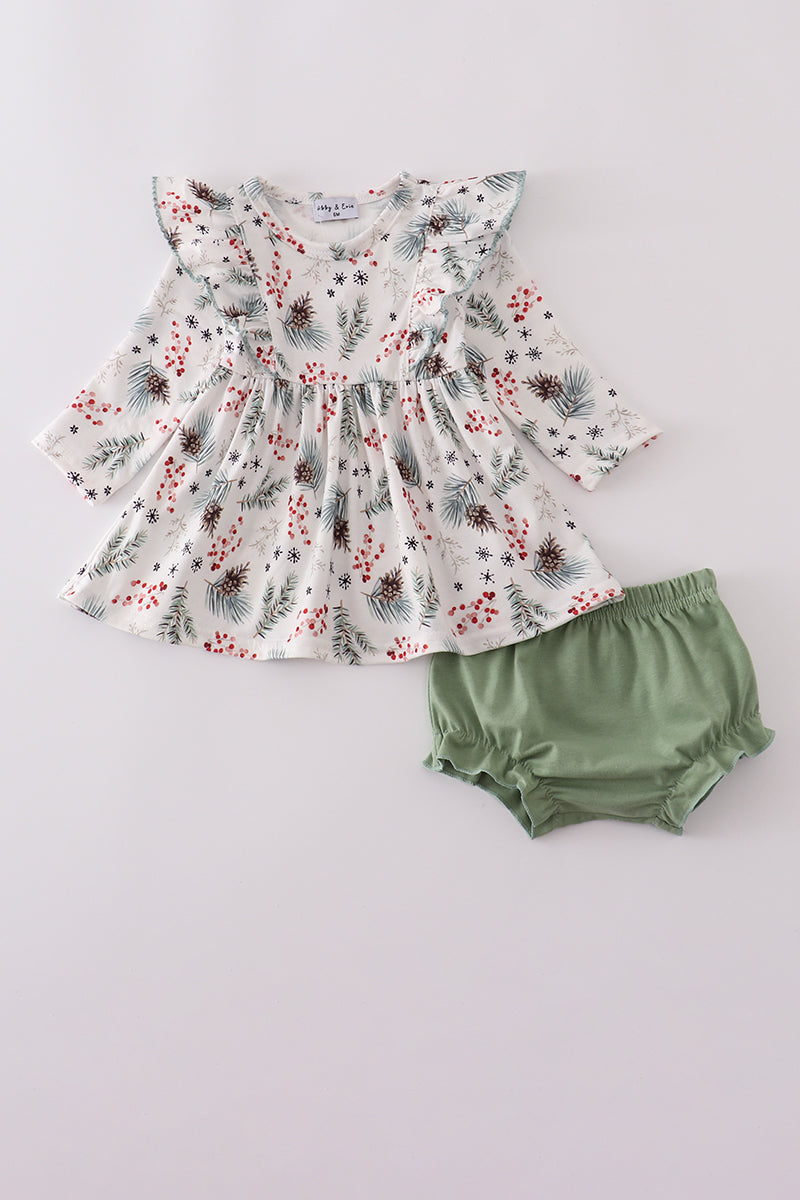 Floral top and green bloomers set on a light gray background