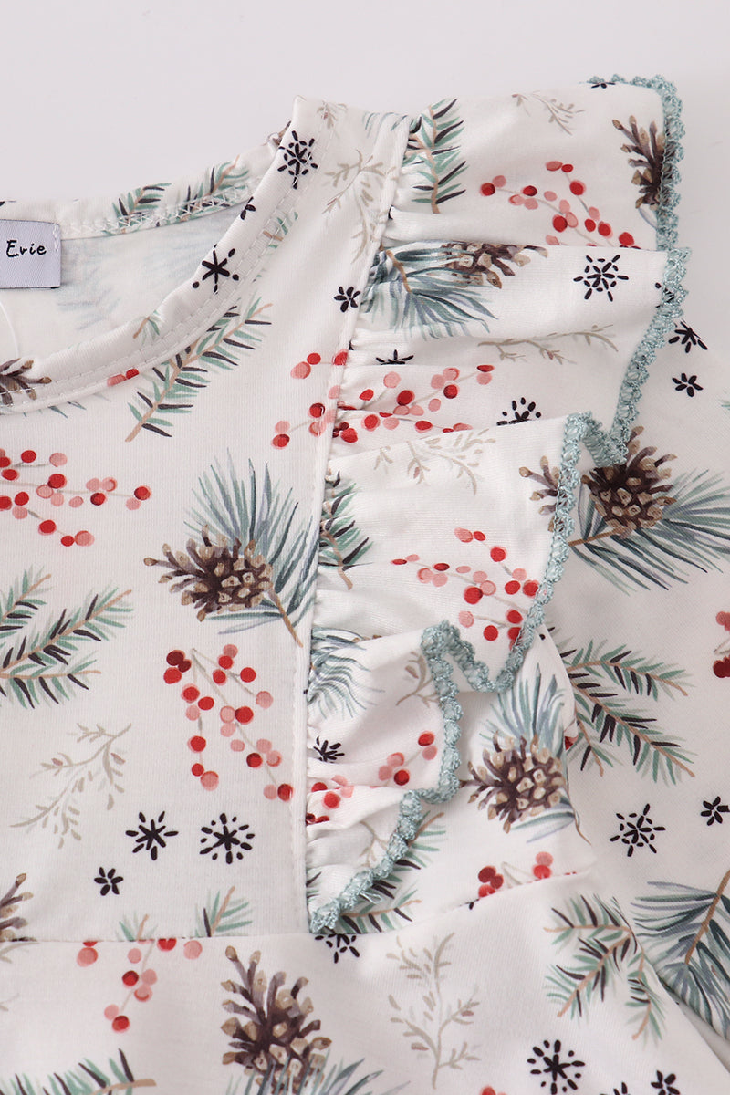 Floral patterned fabric with pine cones and berries on a white background