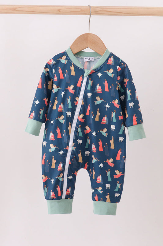 Baby onesie with colorful patterns on a hanger against a white background
