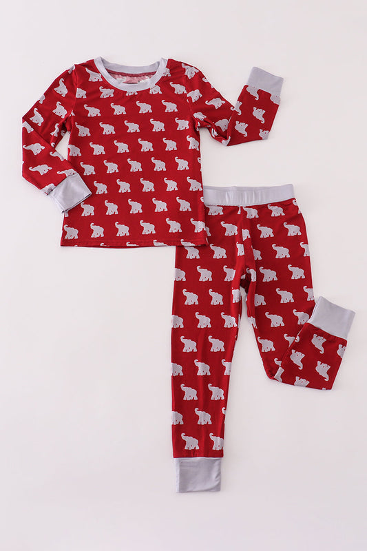 Red pajama set with white bear pattern on a white background