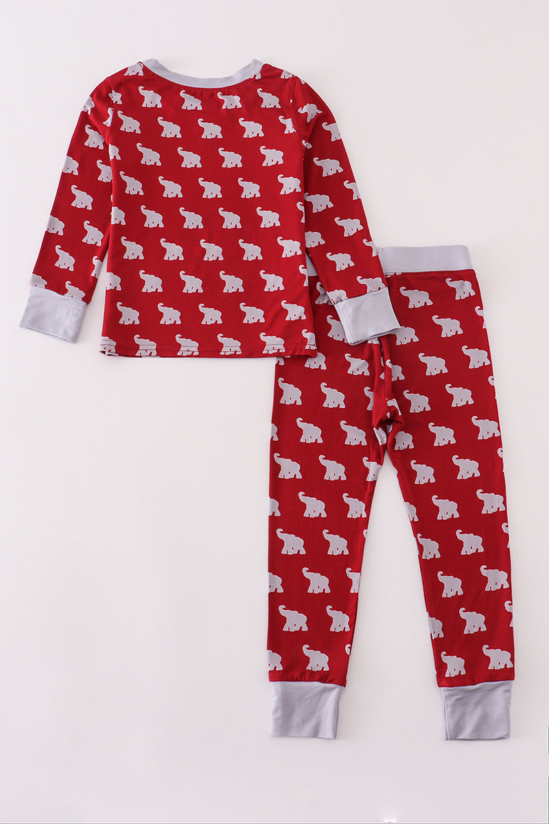 Red pajama set with white bear pattern on a white background