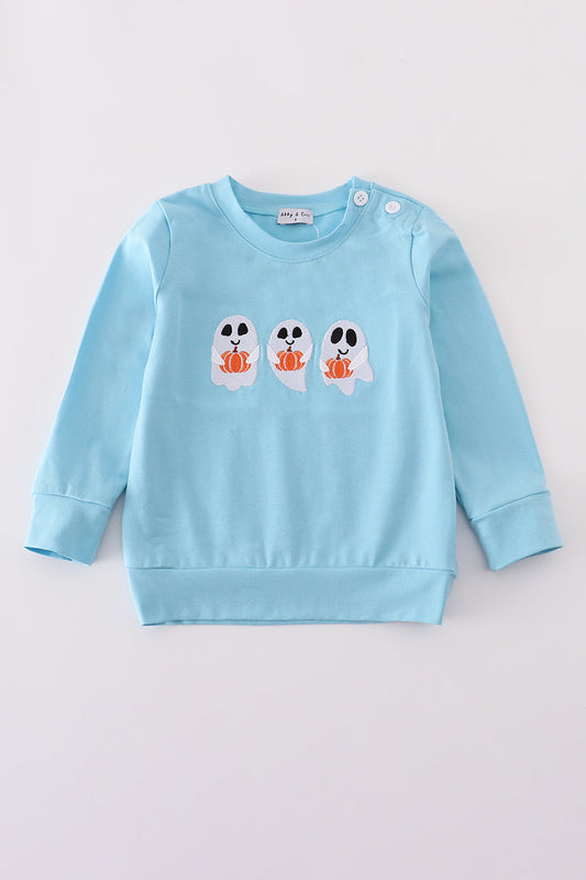 Light blue children's sweatshirt with ghost and pumpkin design on a light gray background