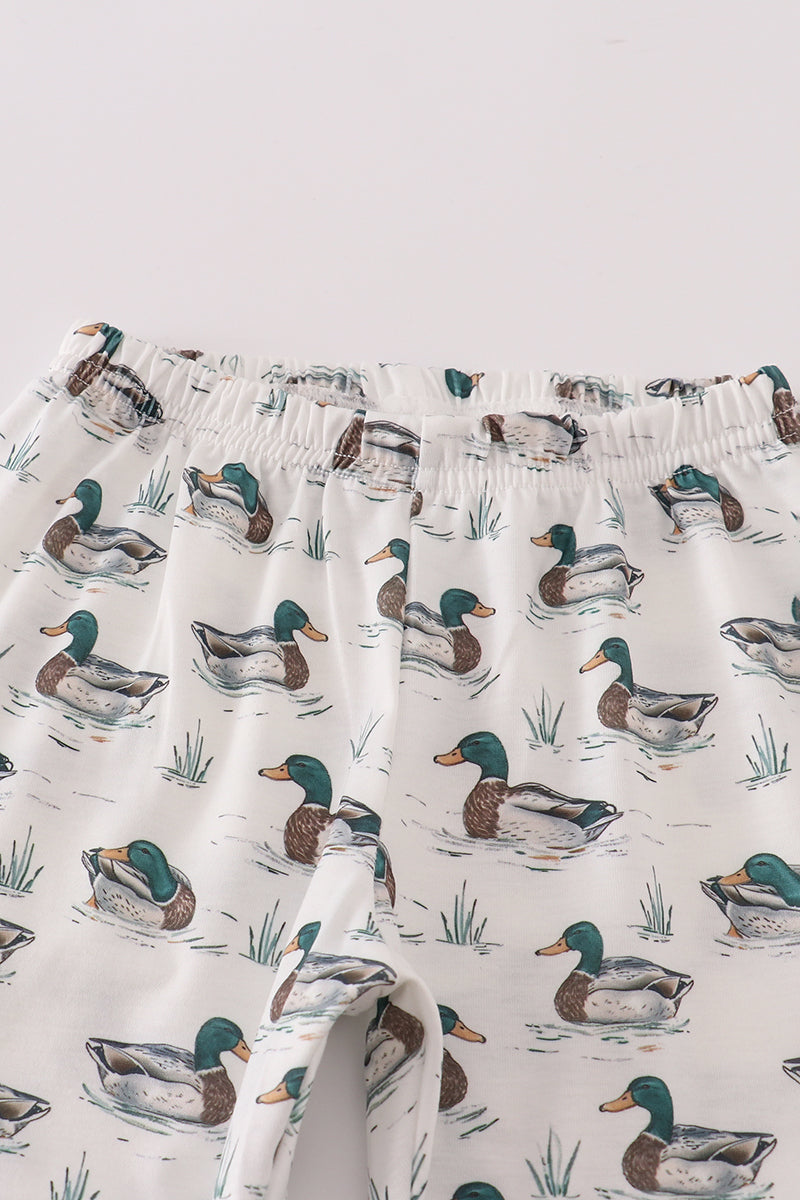 Pajama shorts with duck pattern on a white background