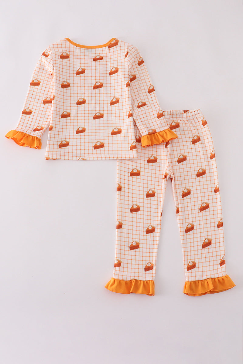 Children's pajama set with pumpkin pattern on a light gray background