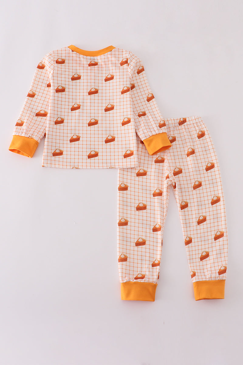 Children's pajama set with burger pattern on a light gray background