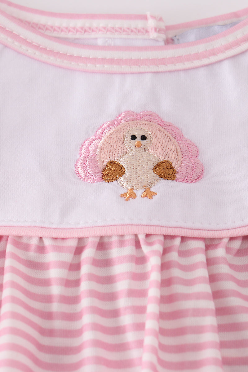 Pink and white striped dress with a embroidered owl design on a white background