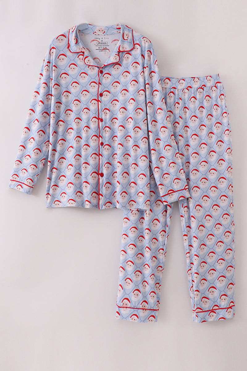 Children's pajama set with Santa Claus pattern on a light gray background