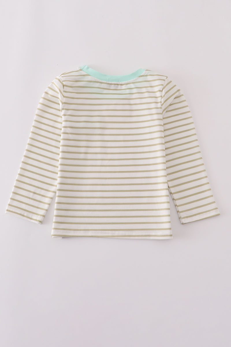 Striped long-sleeve shirt on a light gray background