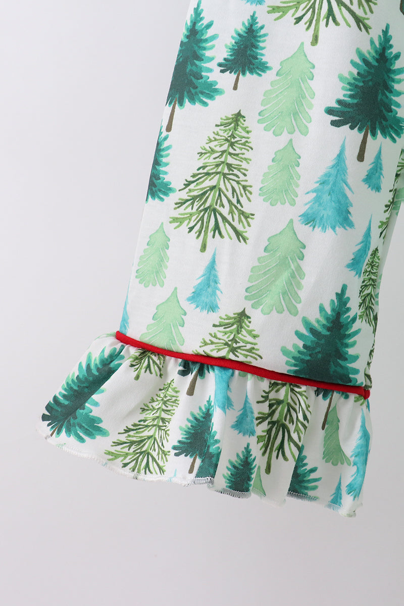 Fabric with green tree pattern on a white background