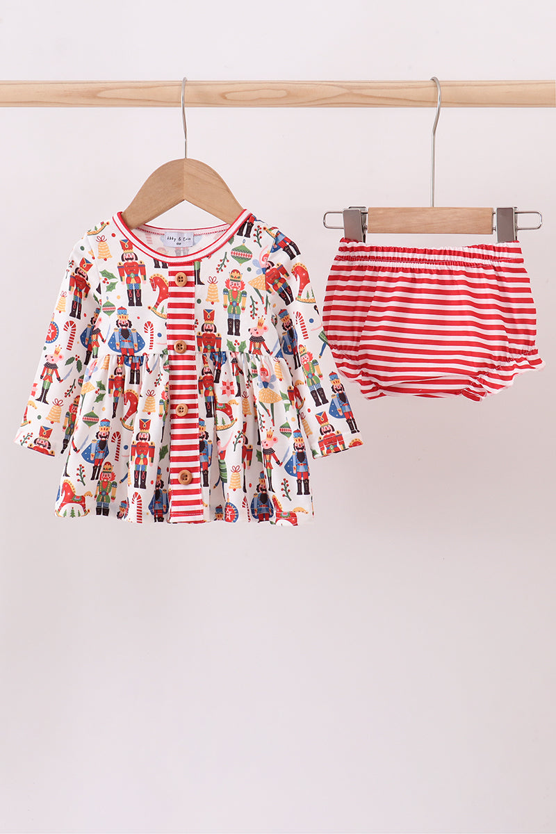 Children's pajama set with nutcracker design on a white background