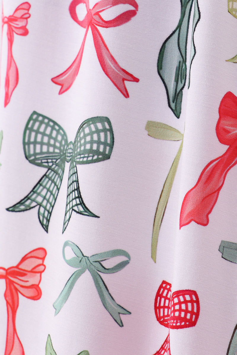 Pattern of colorful bows on a white background