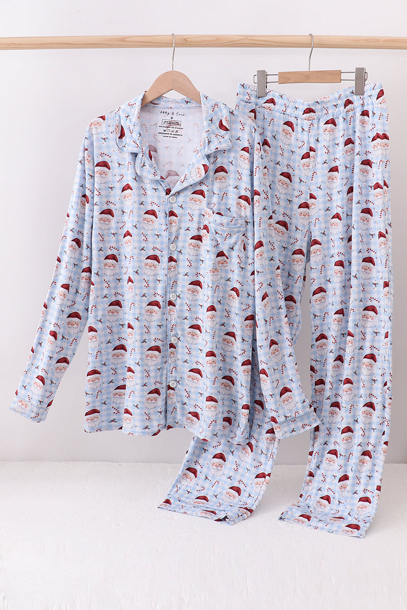 Floral pajama set on hangers against a white background