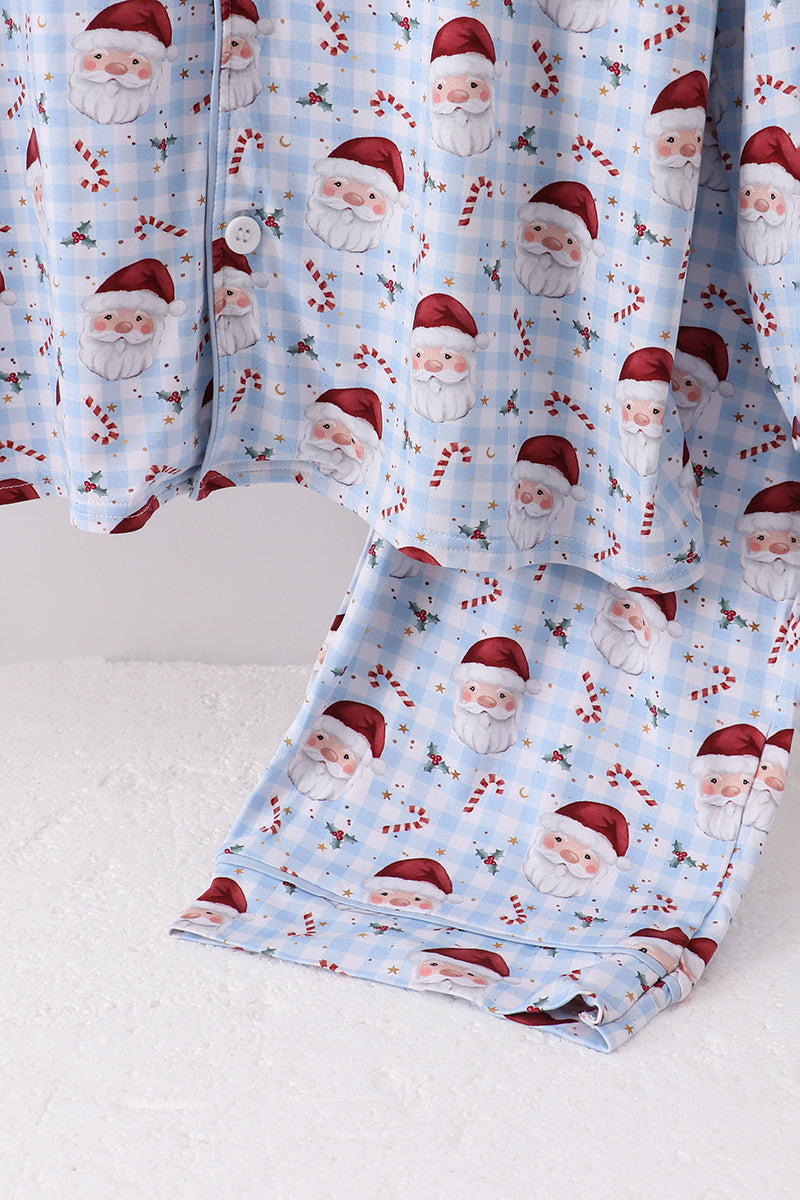 Folded fabric with Santa Claus pattern on a white surface