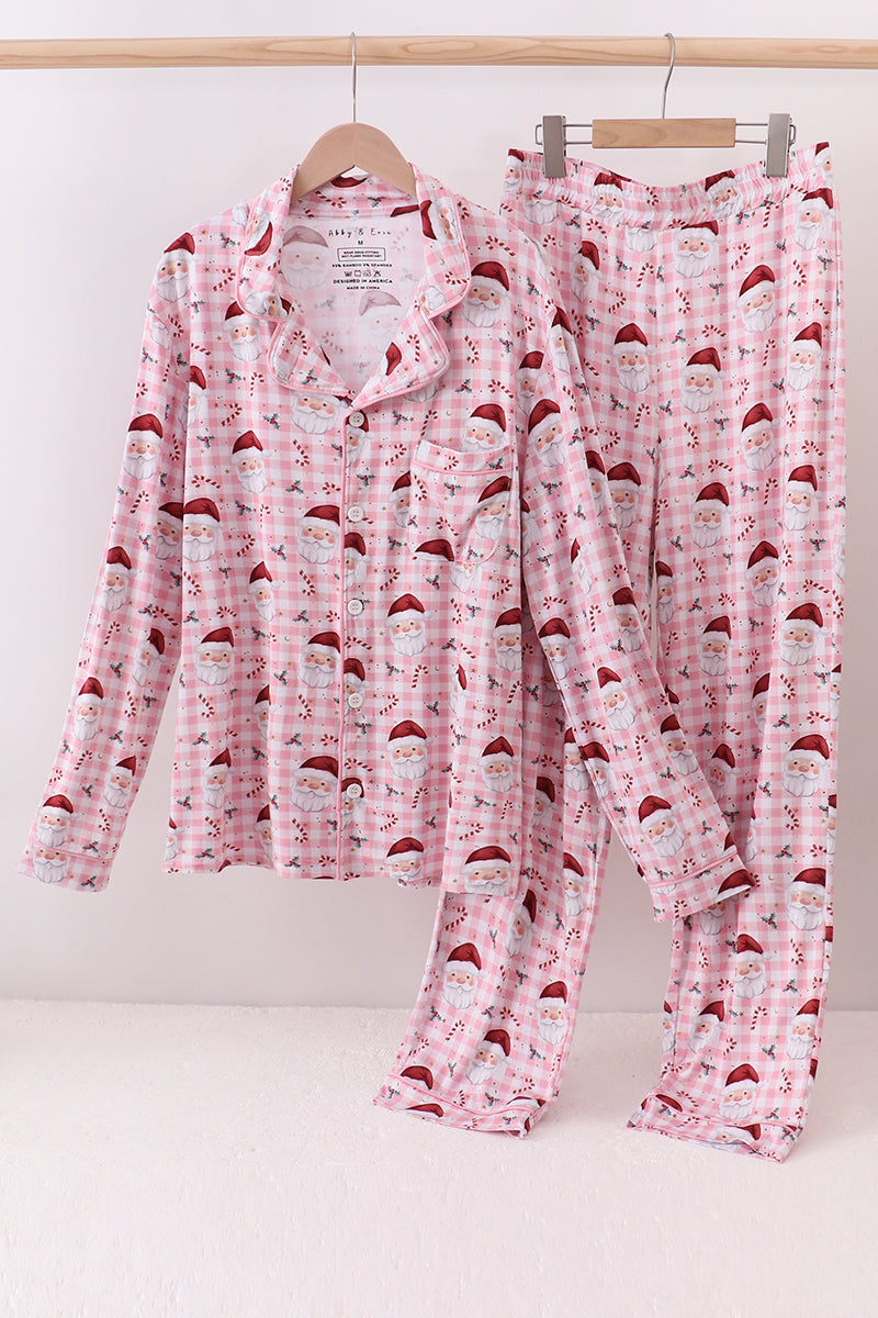 Pink pajama set with Santa hats on a white background