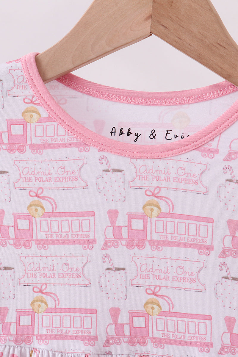 Baby onesie with pink train design and 'Abby & Eric' branding on a hanger.