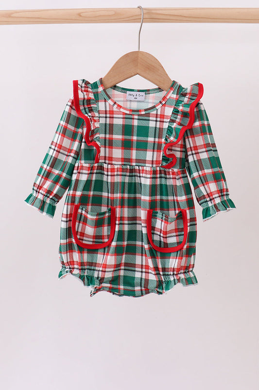 Green and red plaid baby romper with ruffled details on a white background