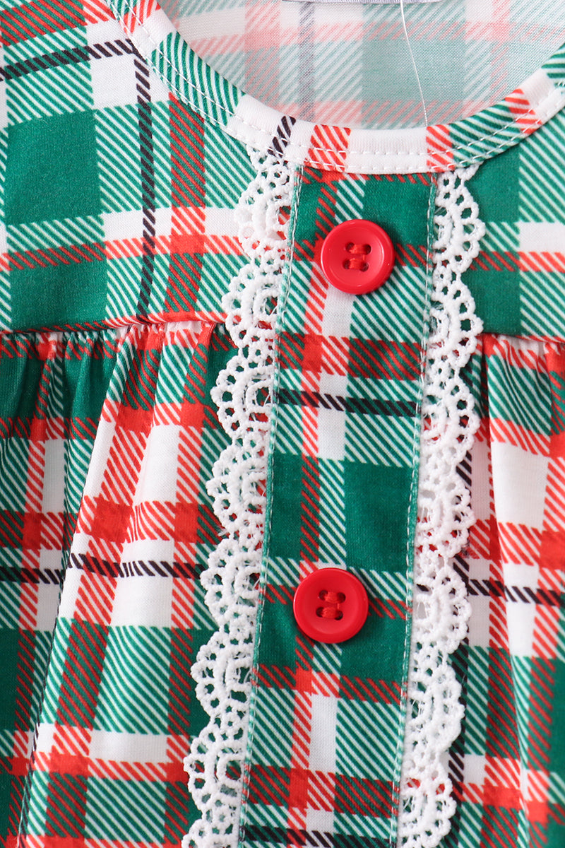 Plaid fabric with red buttons and white lace trim