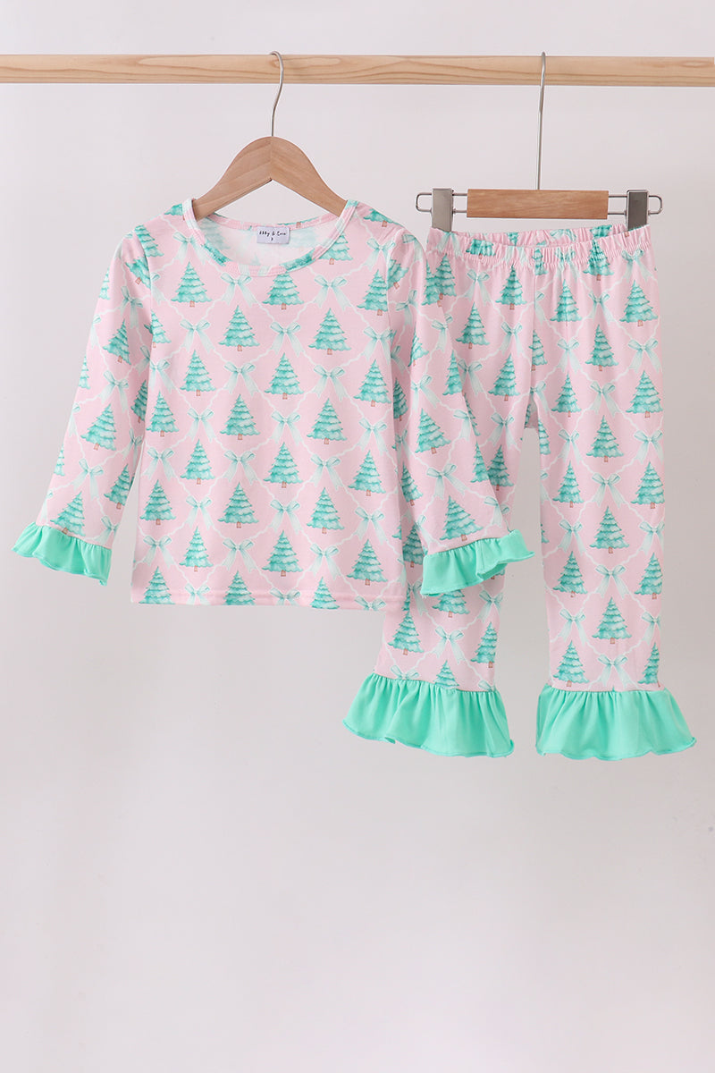Children's pajama set with tree pattern on a white background